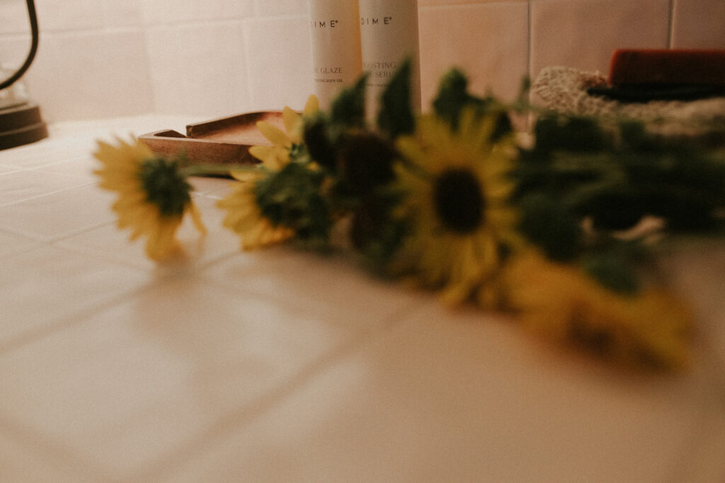 Documentary birth story detail — fresh sunflowers prepared for home birth