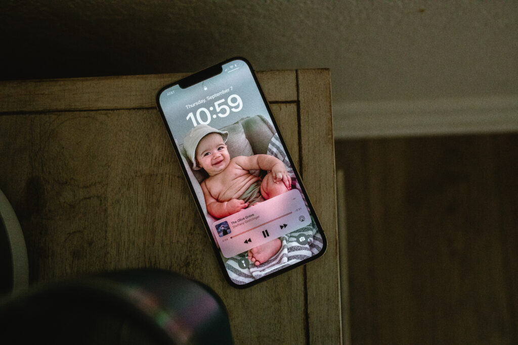 Birth story detail — iPhone on nightstand capturing exact time of baby’s birth