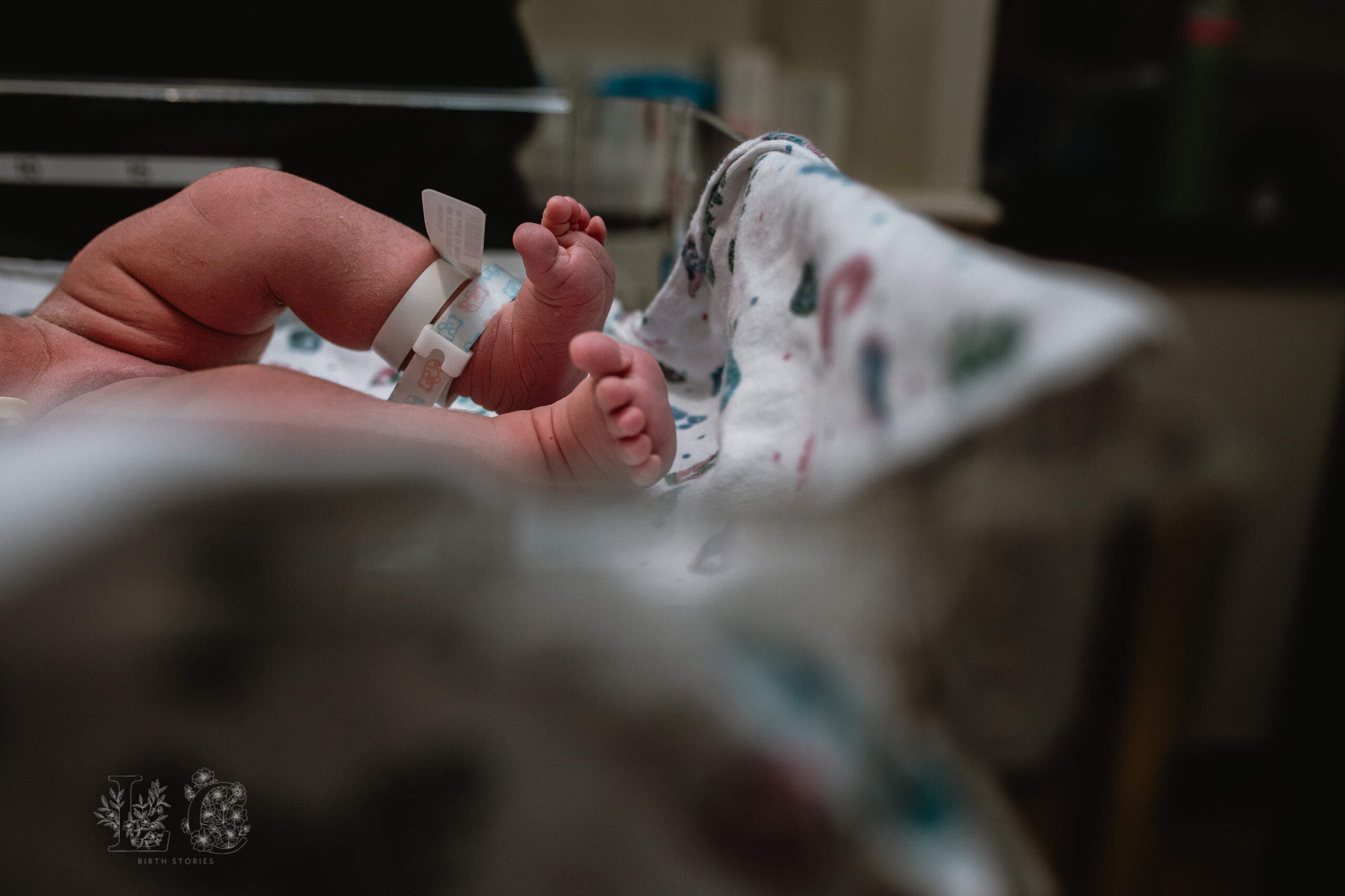 Mother holding her newborn skin-to-skin during the golden hour after birth in Fort Worth.